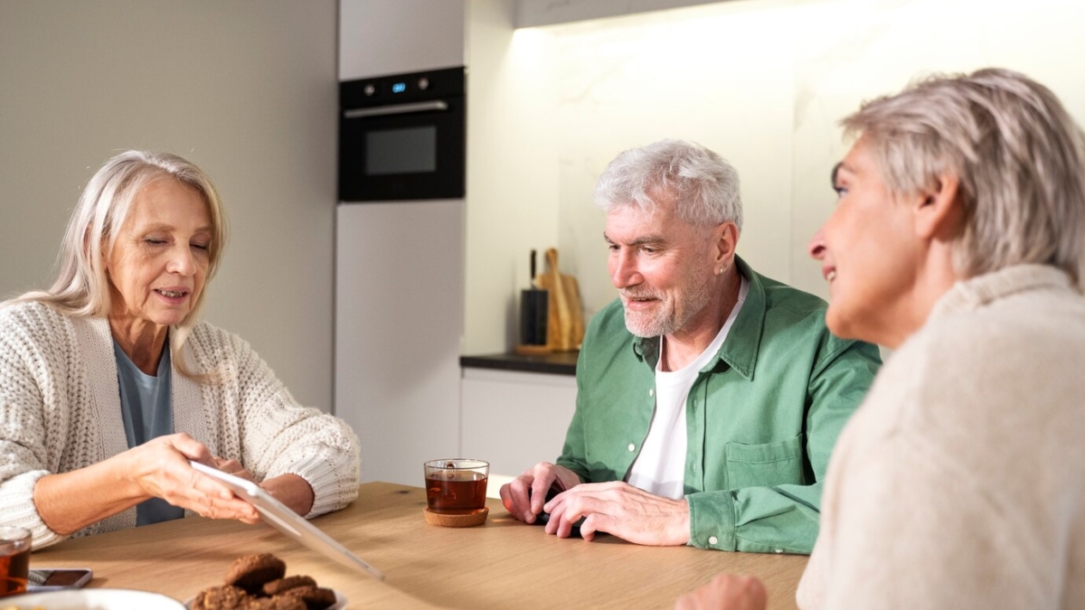 close-up-senior-people-sitting-together_23-2149241670
