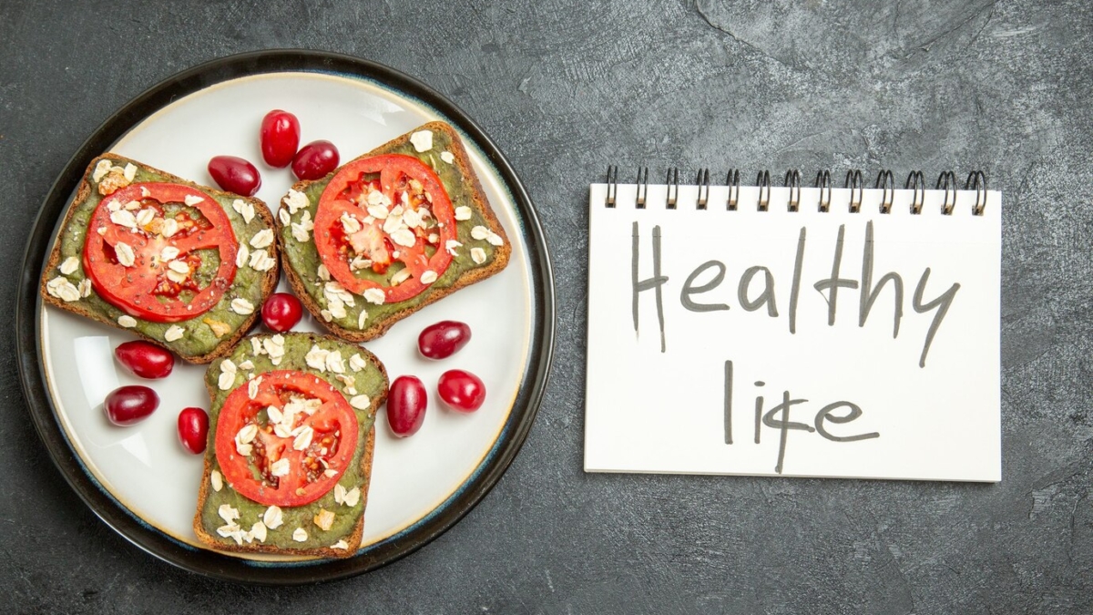 top-view-delicious-sandwiches-with-sliced-tomatoes-healthy-life-writing-grey-surface-snack-bun-burger-sandwich-bread_140725-85905