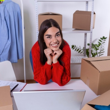 young-woman-owener-small-business-packing-product-boxes-preparing-it-delivery-women-packing-package-with-her-products-that-she-selling-online_657921-1235